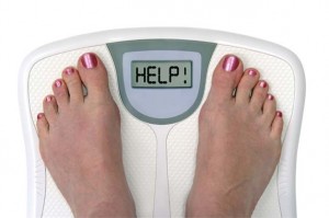 feet on a bathroom scale - isolated